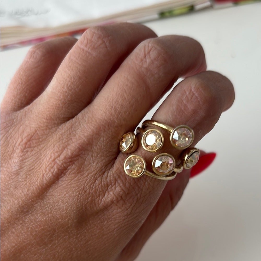 Gold and White Minimalist Ring with Bezel-Set Stones